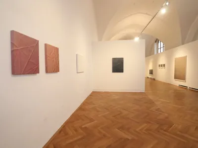 Exhibition view with reliefs by Monika Žáková in Hluboká